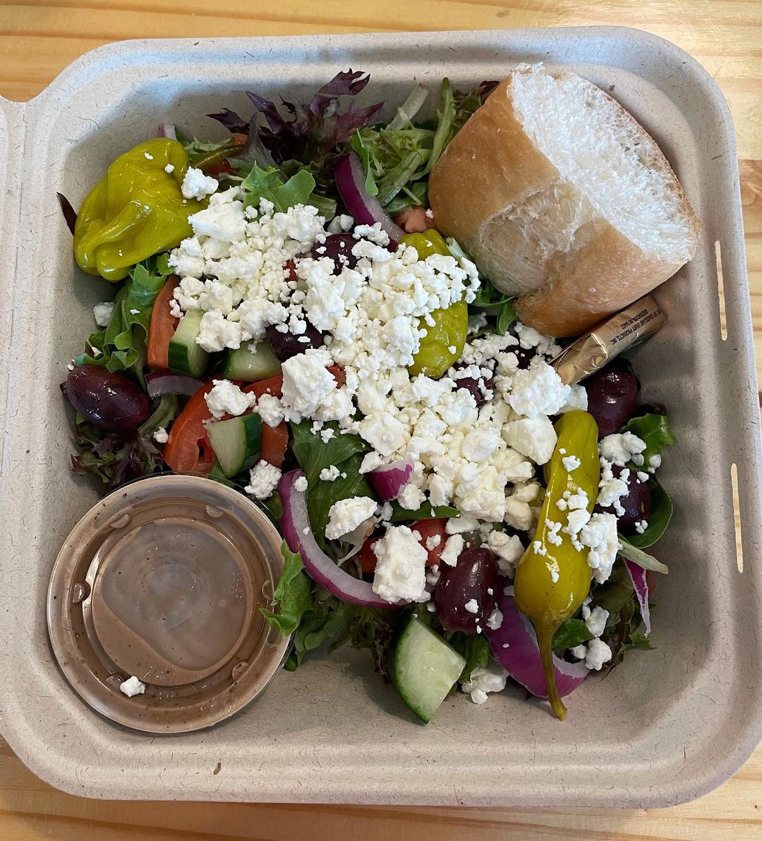 https://mojoscoffeeandmore.com/wp-content/uploads/2021/09/mojos-greek-salad-togo.jpg